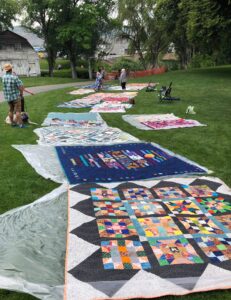 quilts displayed in the park