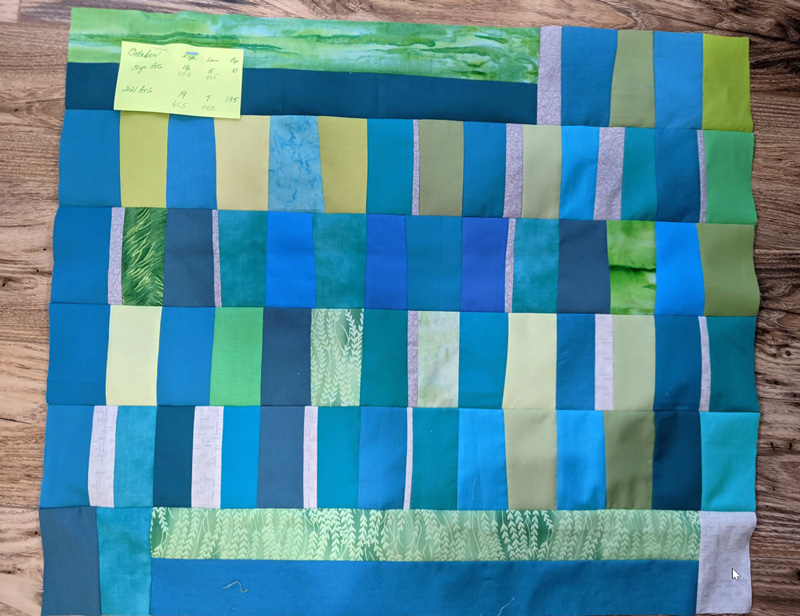 blue and green geometric quilt block